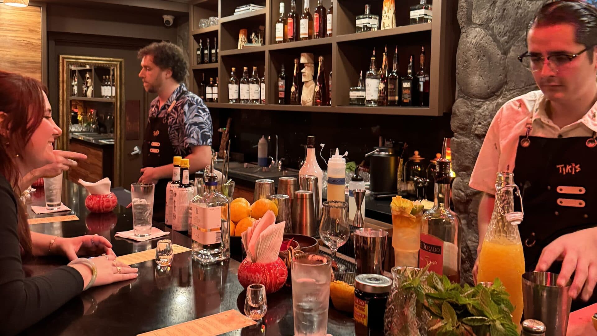 The Lava Lounge, an intimate 12-seat bar tucked inside Tikis Grill & Bar, showcasing a craft cocktail experience with expert bartenders.